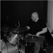 I am an indie rock drummer and would aim to help beginners take their first step into drumming